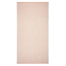 Pink bath towel, rectangular with repeating small check pattern