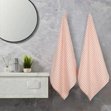 2-piece bath towel set with pink dot-check towels, hanging in pair