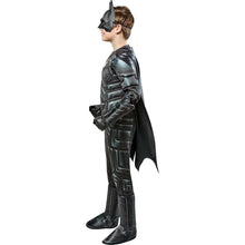 Kids Batman-style costume side view with molded armor panels, black cape, and boot covers.