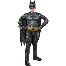 Kids Batman-style muscle costume with molded chest armor, black cape, and mask headpiece.