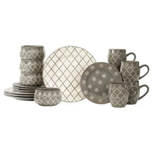 Gray and white geometric dinnerware set with plates, bowls, mugs, and cups