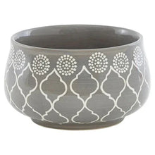 Gray ceramic bowl with white quatrefoil and dot pattern