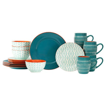 Assorted dinnerware set with teal mugs, patterned plates, and orange accents.