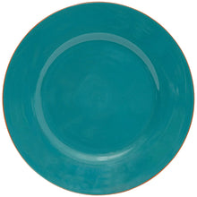 Teal dinner plate with concentric ring design around the center.