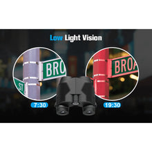 Black binoculars with illuminated dial circles, low-light scene