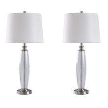 Table lamp with off-white fabric shade and textured clear glass-style body