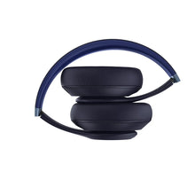 Navy wireless over-ear headphones with padded headband and cushioned earcups