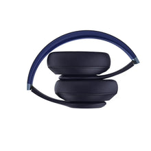 Navy over-ear headphones with padded headband and thick cushioned ear cups