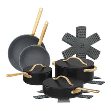 Black ceramic nonstick cookware set with strainer lids and gold-tone handles