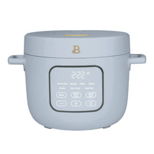 Cornflower blue electric rice cooker with hinged lid and digital control panel.