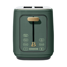 2-slice toaster in dark green with touch-activated control panel and gold lever