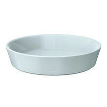 Light blue stoneware pie dish with wide rim and centered base stamp