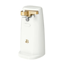 White electric can opener with gold handle and cutting head