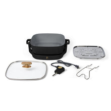 Detachable electric skillet set with pan, glass lid, steaming insert, cord, and stand