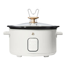 White programmable slow cooker with black lid, gold knob, and digital control panel