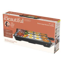 XL electric griddle shown on its retail box, with a wide cooking surface and black base