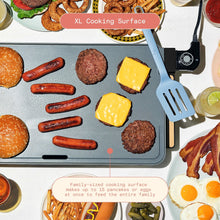 XL electric griddle with a wide cooking surface holding burgers, sausages and buns