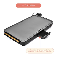 XL electric griddle with removable drip tray extended from the black base
