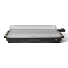 XL electric griddle with gray cooking surface, raised back guard, black base and temperature control