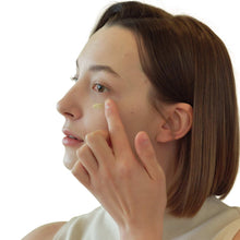 Eye serum gel under eye blended with fingertips
