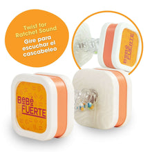 Bebe Fuerte twist-and-shake dumbbell baby toy with clear beads and orange-ring ends