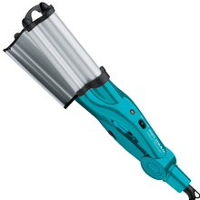 Deep hair waver with turquoise handle and silver barrel with black clamp