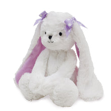 Plush bunny with white fur, purple bows and lavender wings, sitting pose