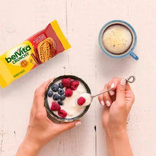 BelVita Crunchy cinnamon brown sugar biscuits with fruit and coffee in bowl