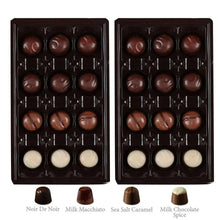 Chocolate truffle assortment tray with dark, milk, caramel, and white truffles