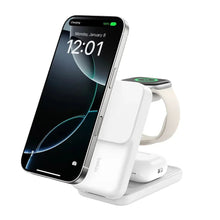 White 3-in-1 Qi charging stand holding a smartphone with a green status light
