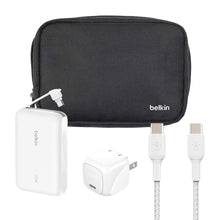 Black travel pouch with white power bank, USB-C wall charger, and cables
