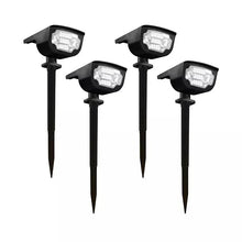 Set of four solar LED landscape spotlights with adjustable heads and stake bases