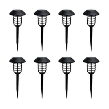 Black solar pathway stake lights with lantern-style tops, plastic, multiple pack view.