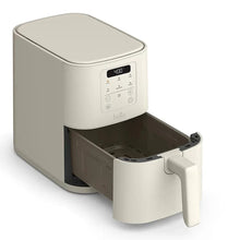 4-qt slim air fryer, white, shown open with empty basket and front handle