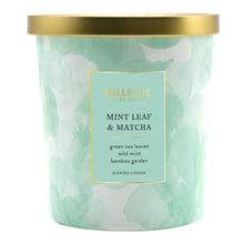 Bellevue scented candle jar with gold lid, Mint Leaf & Matcha label on green glass.