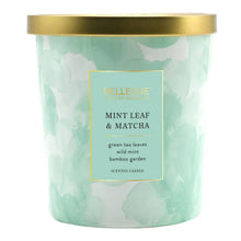 Scented candle jar with gold lid, mint green marbled wax, label reads Mint Leaf & Matcha
