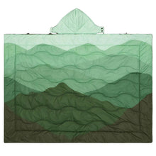 Green wearable blanket with hood and snap closure, quilted waves