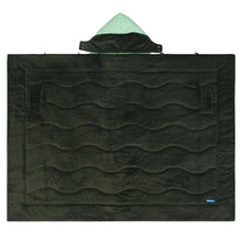 Dark green wearable blanket with hood, quilted wave pattern and small tag