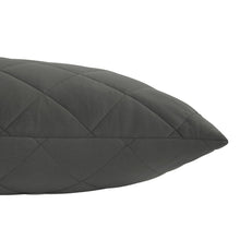 Dark gray diamond-quilted body pillow detail, padded seams