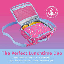 Pink insulated lunch bag open with pink snap lunch box inside