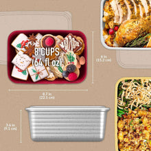 Gray deep-dish food container with lid beside clear tray with cooked food