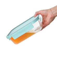 Bentgo glass food storage container with teal lid, hand lifting lid