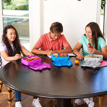 Purple 4-compartment Bentgo Fresh lunch boxes on table, lids open