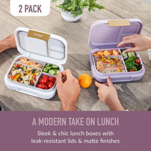 2-pack lunch boxes in white and lavender, both open with divided compartments