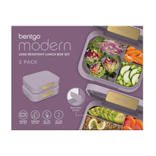 Leak-resistant lunch box set, 2 pack, shown with open compartments on package