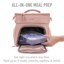 Pink meal prep bag open with stacked containers inside