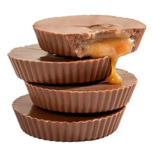 Stack of caramel-filled chocolate cups with gooey caramel topping