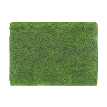 Artificial grass turf mat, dense green surface with short blades