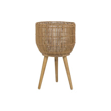 Round resin rattan planter with acacia wood legs, front view