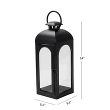 Black metal lantern candle holder, 14 in tall, with arched glass panels and handle